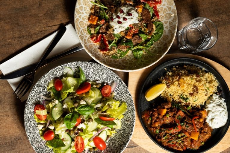 Salads and share plates on the table