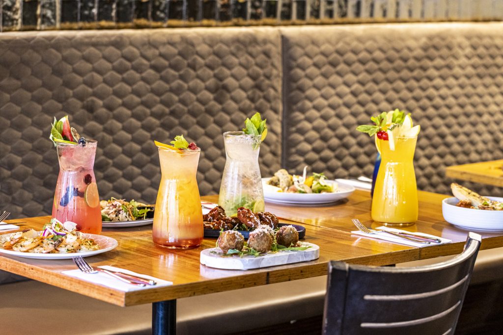 a table of cocktail jugs