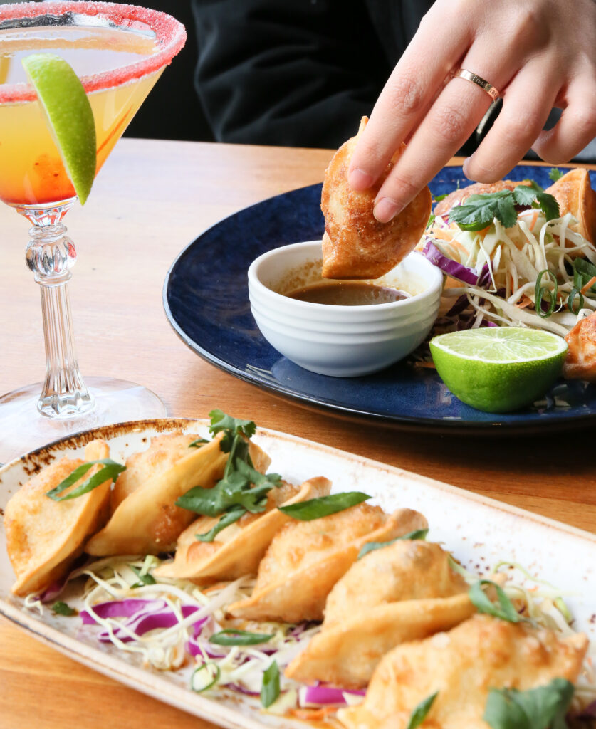 Pork and ginger dumplings with a cocktail